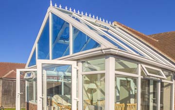 conservatory roof insulation costs Holly Cross